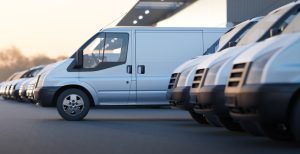 fleet of vehicles in car park